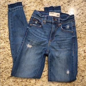 EUC Garage Distressed Jeans with Raw Hem